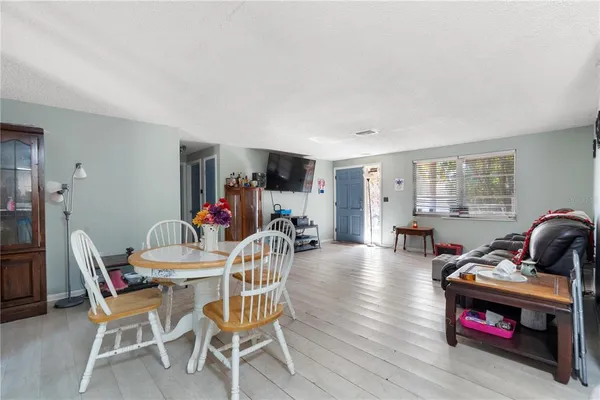 a view of a livingroom with furniture and a livingroom