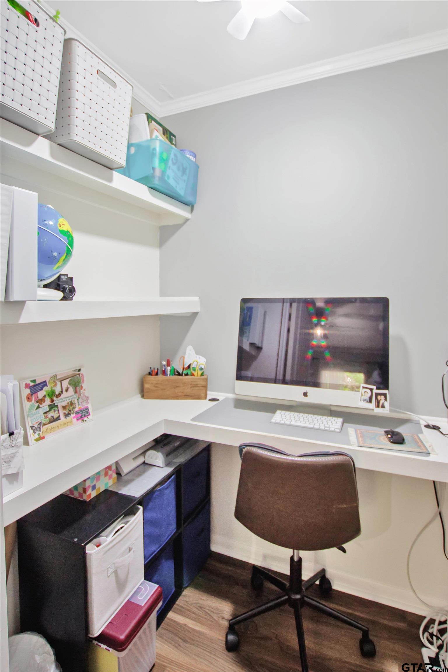 1908 Waunell Drive Tyler, TX 75701 - Photo 13 of 39 a workspace with furniture and wooden floor