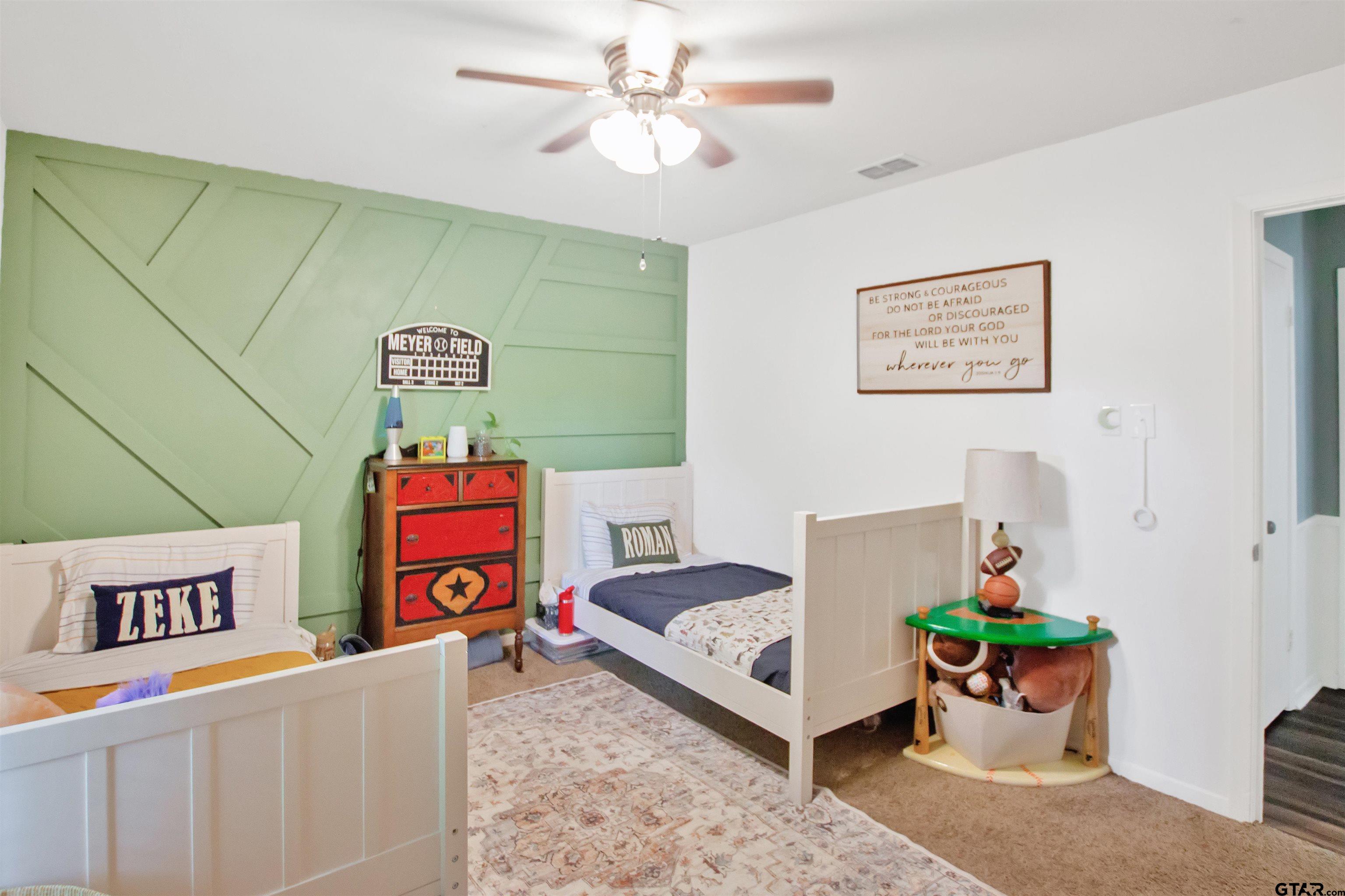 1908 Waunell Drive Tyler, TX 75701 - Photo 19 of 39 a living room with furniture and a couch