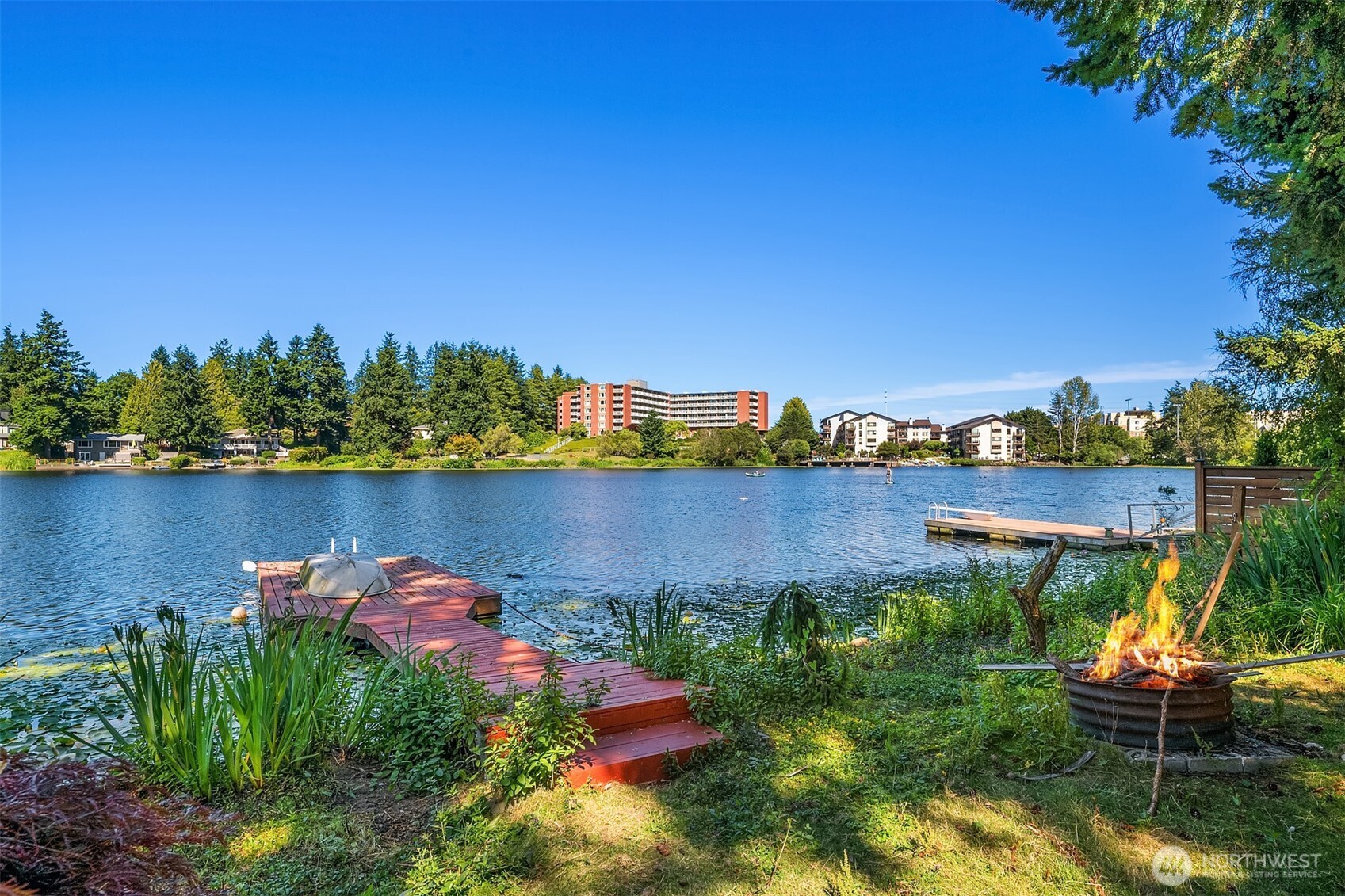 13302 Bitter Place North Seattle, WA 98133 - Photo 4 of 16 a view of a lake with a garden