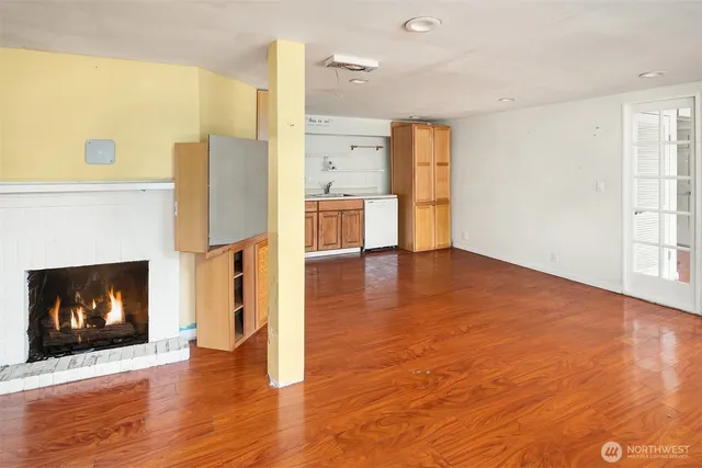 a view of a living room a window and a fireplace