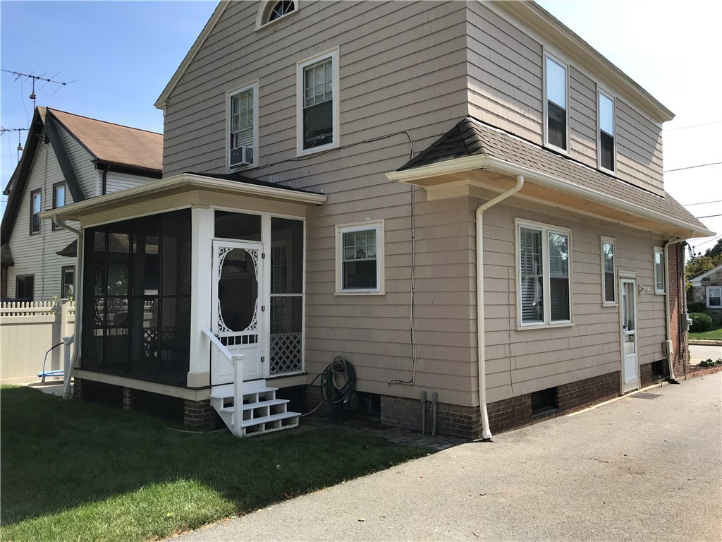 87 Calaman Road Cranston, RI 02910 - Photo 29 of 38 Rear of home and side entrance