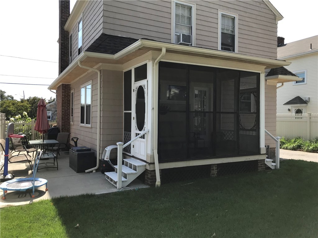 87 Calaman Road Cranston, RI 02910 - Photo 33 of 38 Screened in Porch and Patio