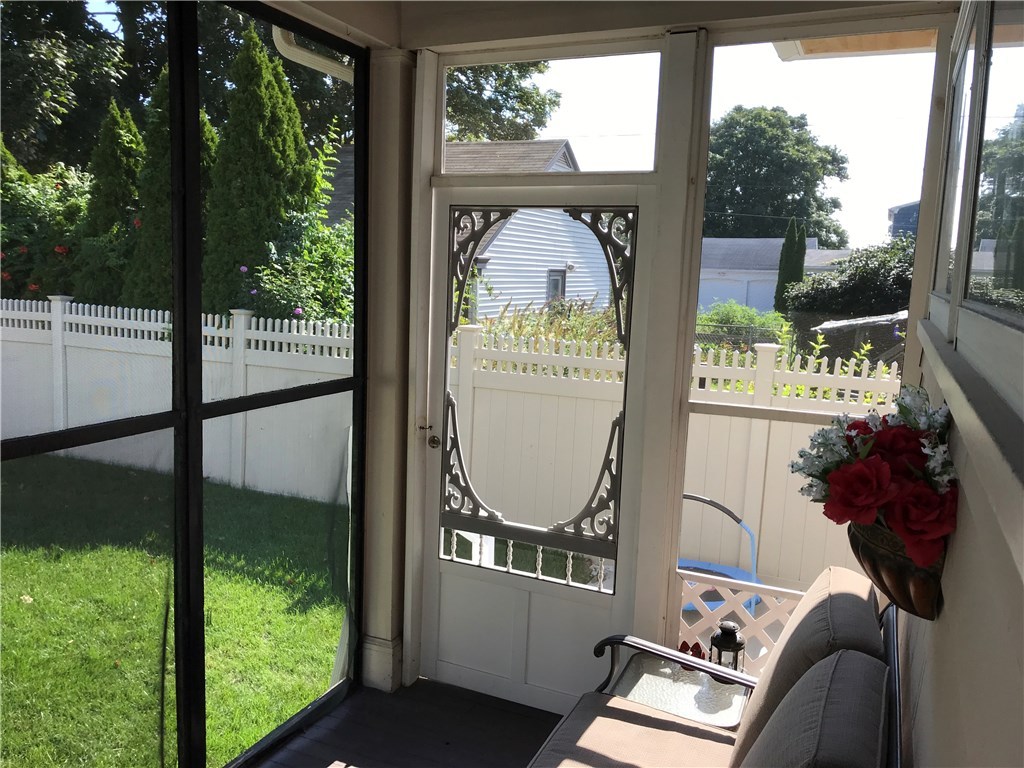 87 Calaman Road Cranston, RI 02910 - Photo 35 of 38 Entrance to Screened In Porch from Patio
