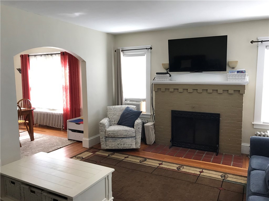 87 Calaman Road Cranston, RI 02910 - Photo 7 of 38 Fireplace Living Room Open to Dining Room
