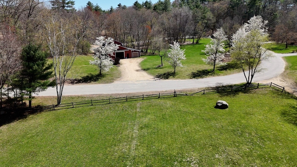 0 Wildwood Road East Brookfield, MA 01515 - Photo 26 of 38 an aerial view of a house with a yard and lake view