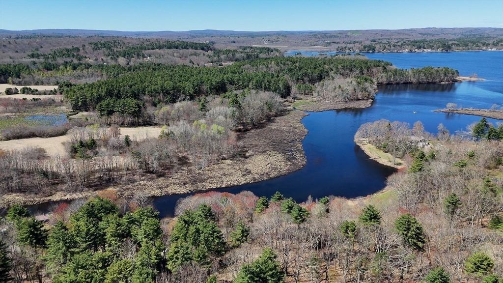0 Wildwood Road East Brookfield, MA 01515 - Photo 10 of 38 a view of a lake with a mountain