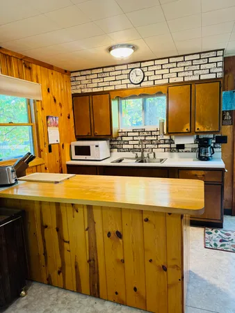 $314,900 | 5112 North Bass Lake Road, Irons, MI 49644