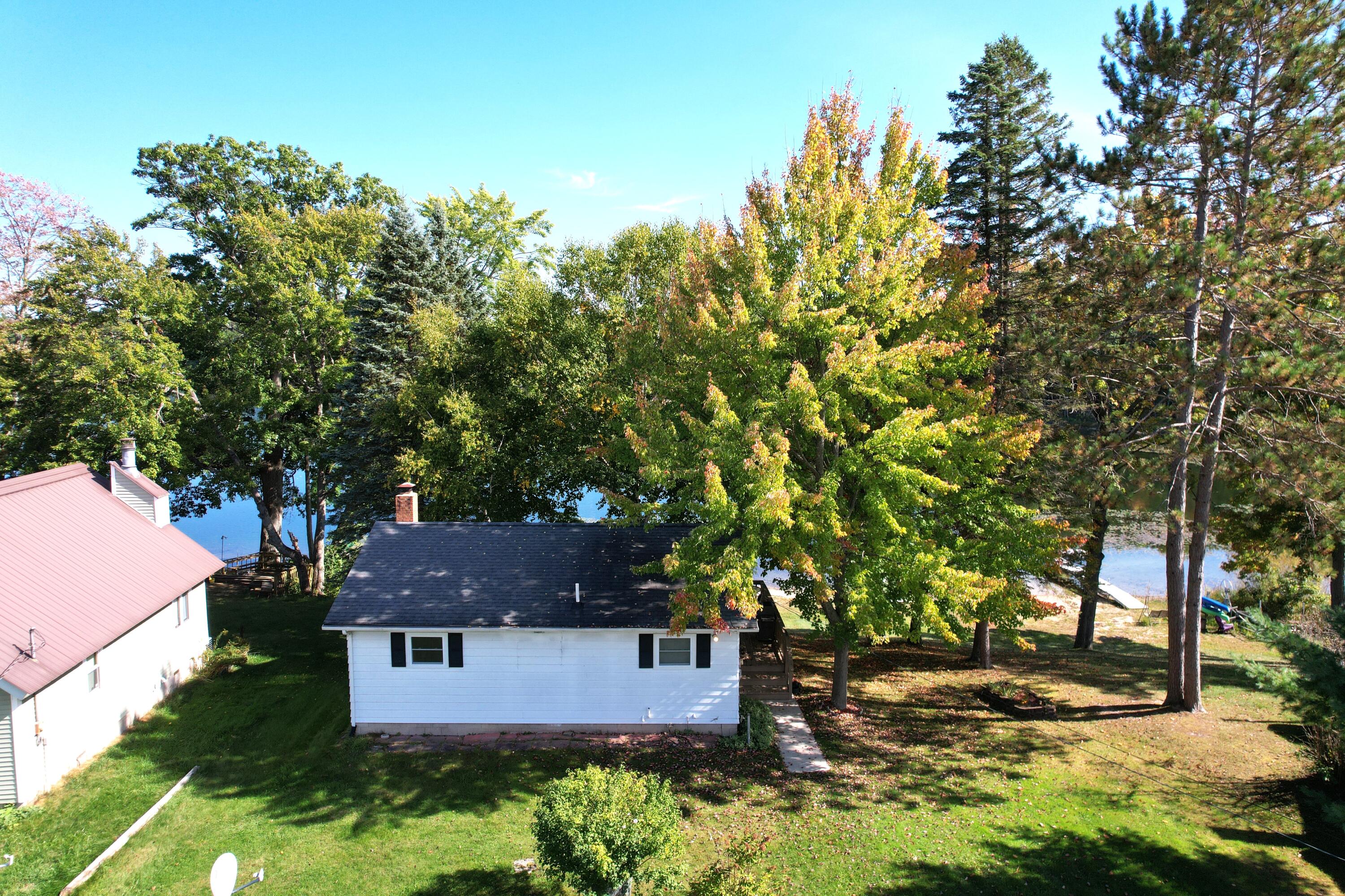 5112 North Bass Lake Road Irons, MI 49644 - Photo 3 of 41 Back of cottage
