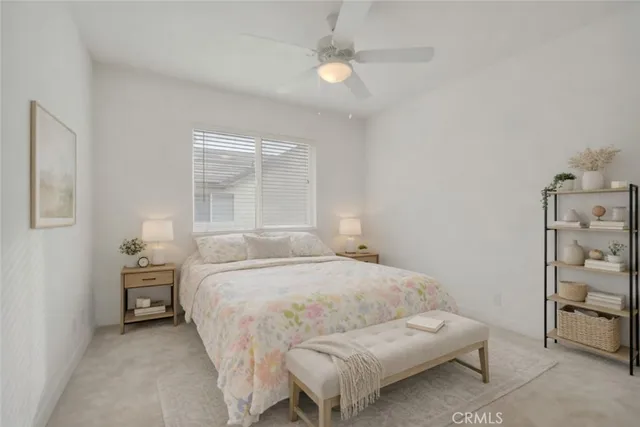 a bedroom with a bed and a cabinets