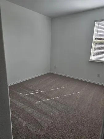 a view of empty room with window