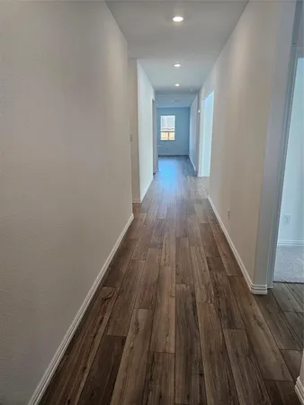 a view of livingroom with wooden floor