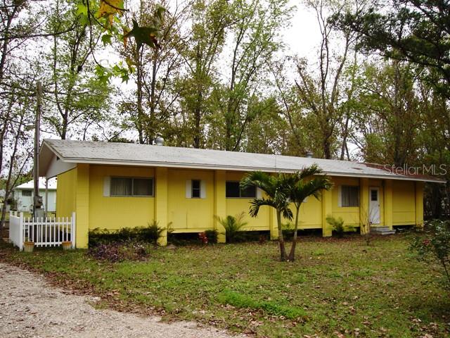 56516 Pecan Road Astor, FL 32102 - Photo 1 of 1 Welcome to 56516 Pecan - "A Ray of Sunshine"