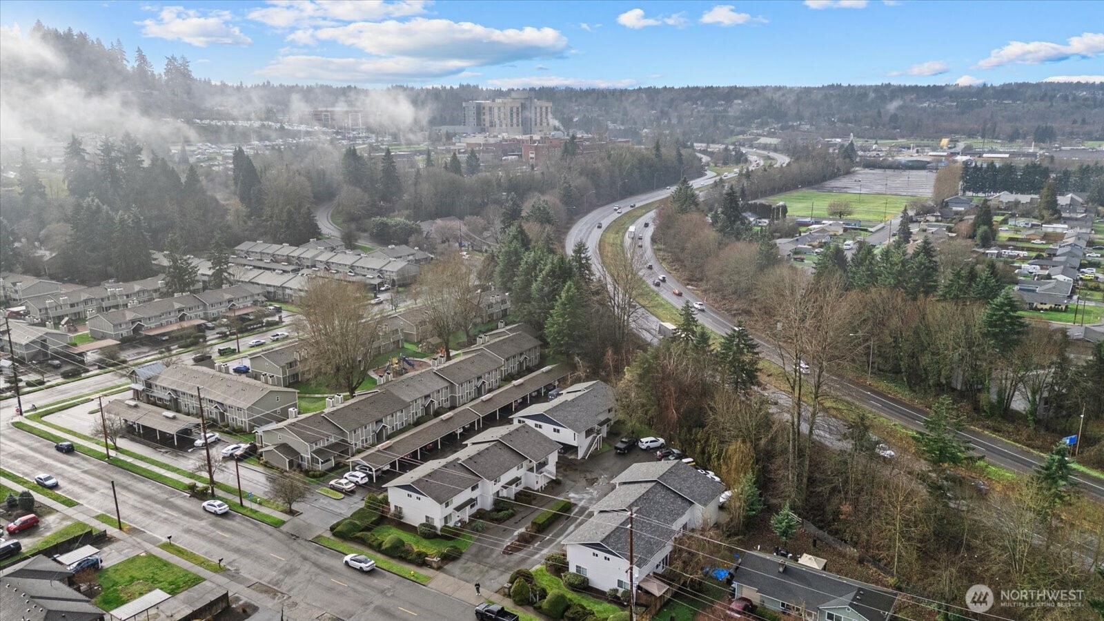 1016 9th Street Southeast, Unit 7 Puyallup, WA 98372 - Photo 26 of 29 an aerial view of a city