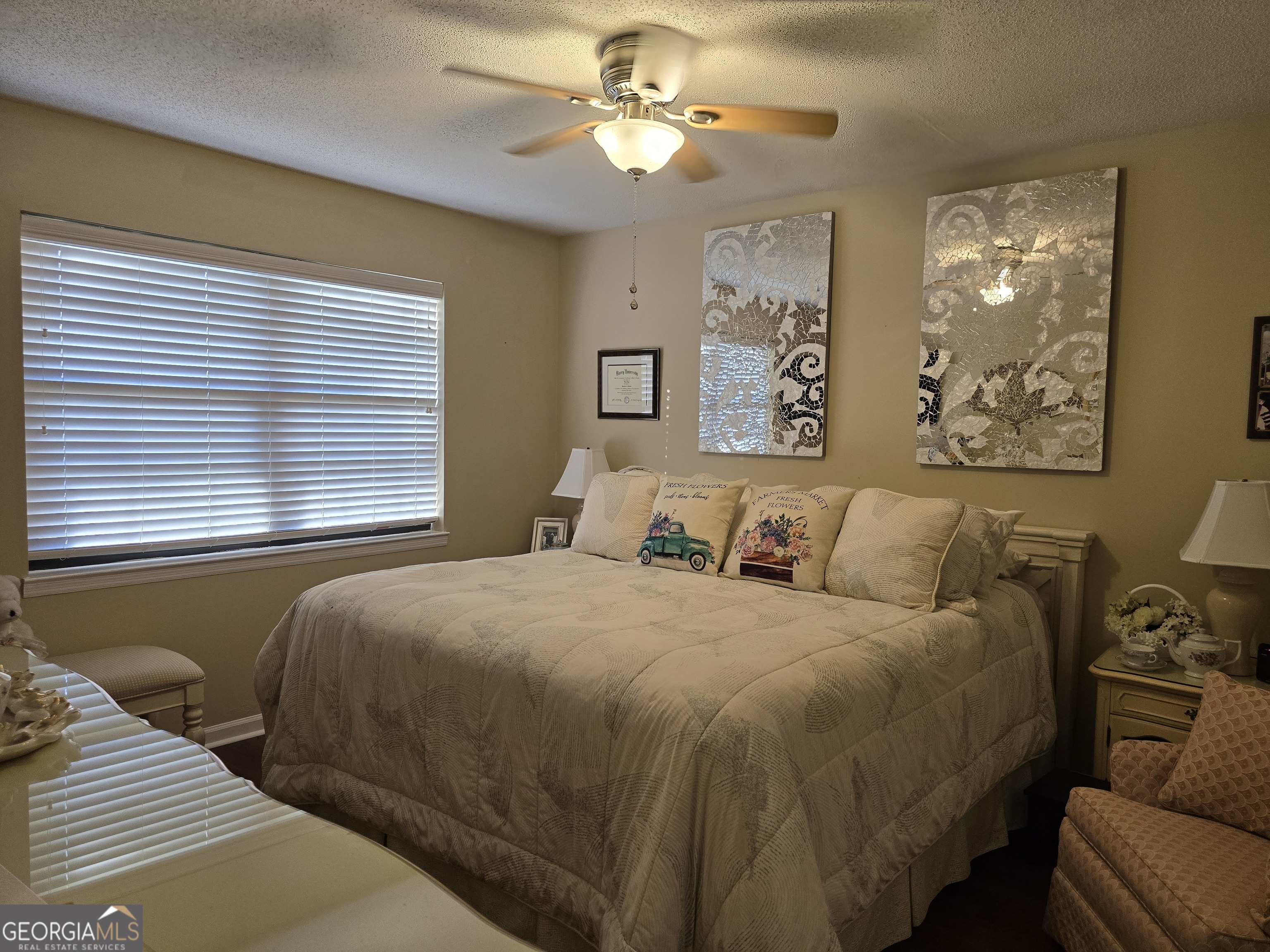 479 Mitchell Loop Bluffton, GA 39824 - Photo 30 of 51 a bedroom with a bed couches and window