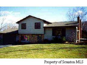 White's Ferry Rd Lake Tunkhannock, PA 18657 - Photo 1 of 4 a house view with a garden space