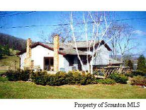 White's Ferry Rd Lake Tunkhannock, PA 18657 - Photo 2 of 4 a view of a house with backyard