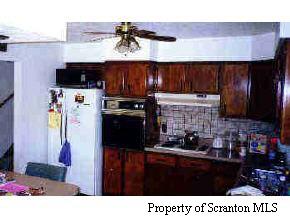 White's Ferry Rd Lake Tunkhannock, PA 18657 - Photo 4 of 4 a kitchen with stainless steel appliances kitchen island granite countertop a refrigerator and a stove