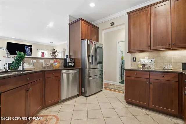 a view of a livingroom with furniture and a rug