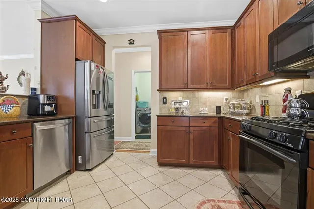 a bathroom with a toilet a sink and a mirror