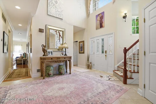 a bedroom with a bed and a area