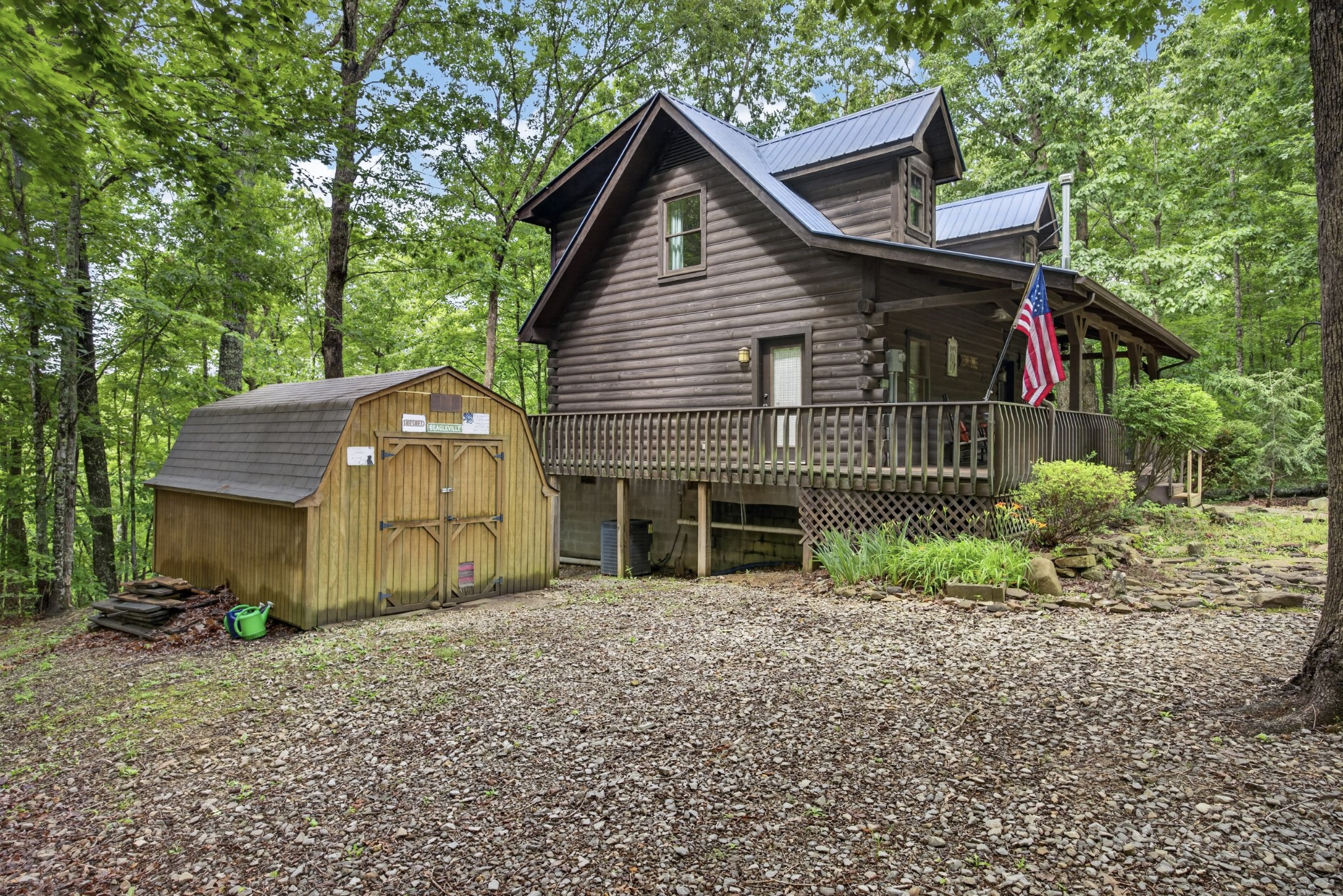 55214 Maynard Ridge Lane Crawford, TN 38554 - Photo 23 of 32 a front view of a house with garden