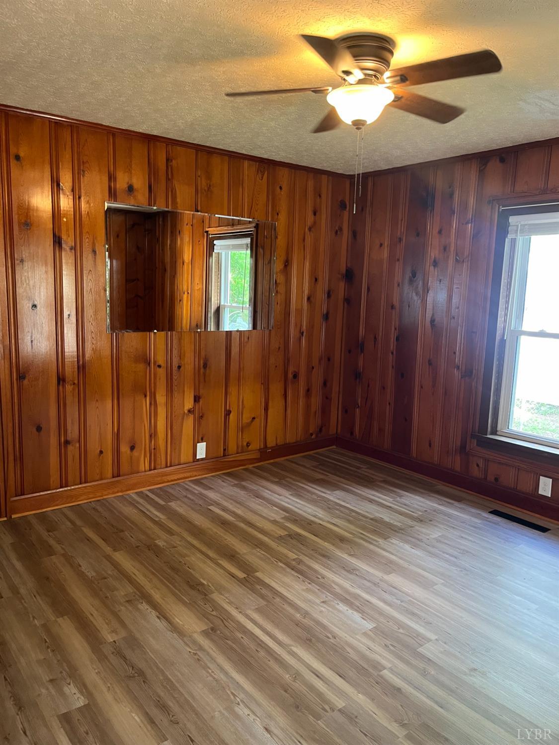 1109 Amherst Avenue Altavista, VA 24517 - Photo 8 of 23 a view of an empty room with a window