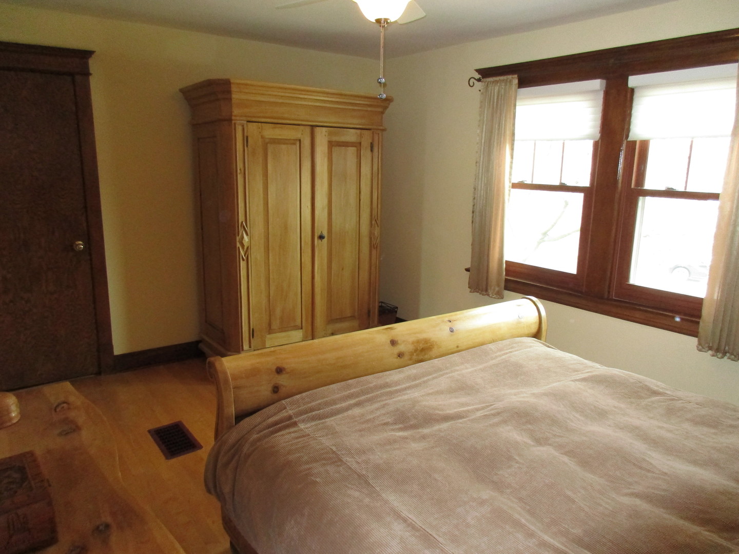 317 Shenstone Road Riverside, IL 60546 - Photo 16 of 21 a bedroom with a bed and a large window