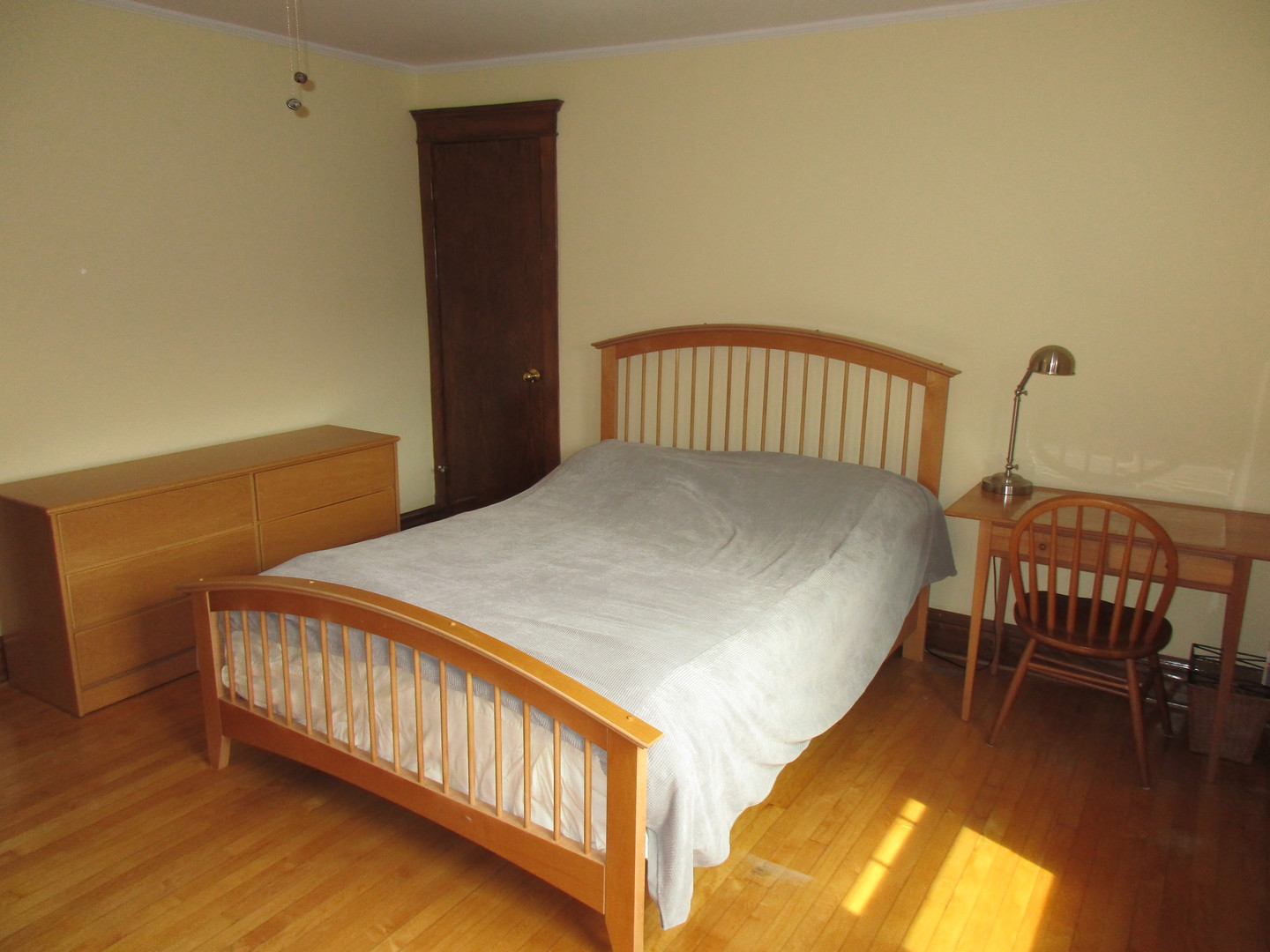 317 Shenstone Road Riverside, IL 60546 - Photo 17 of 21 a bed sitting in a bedroom next to a window