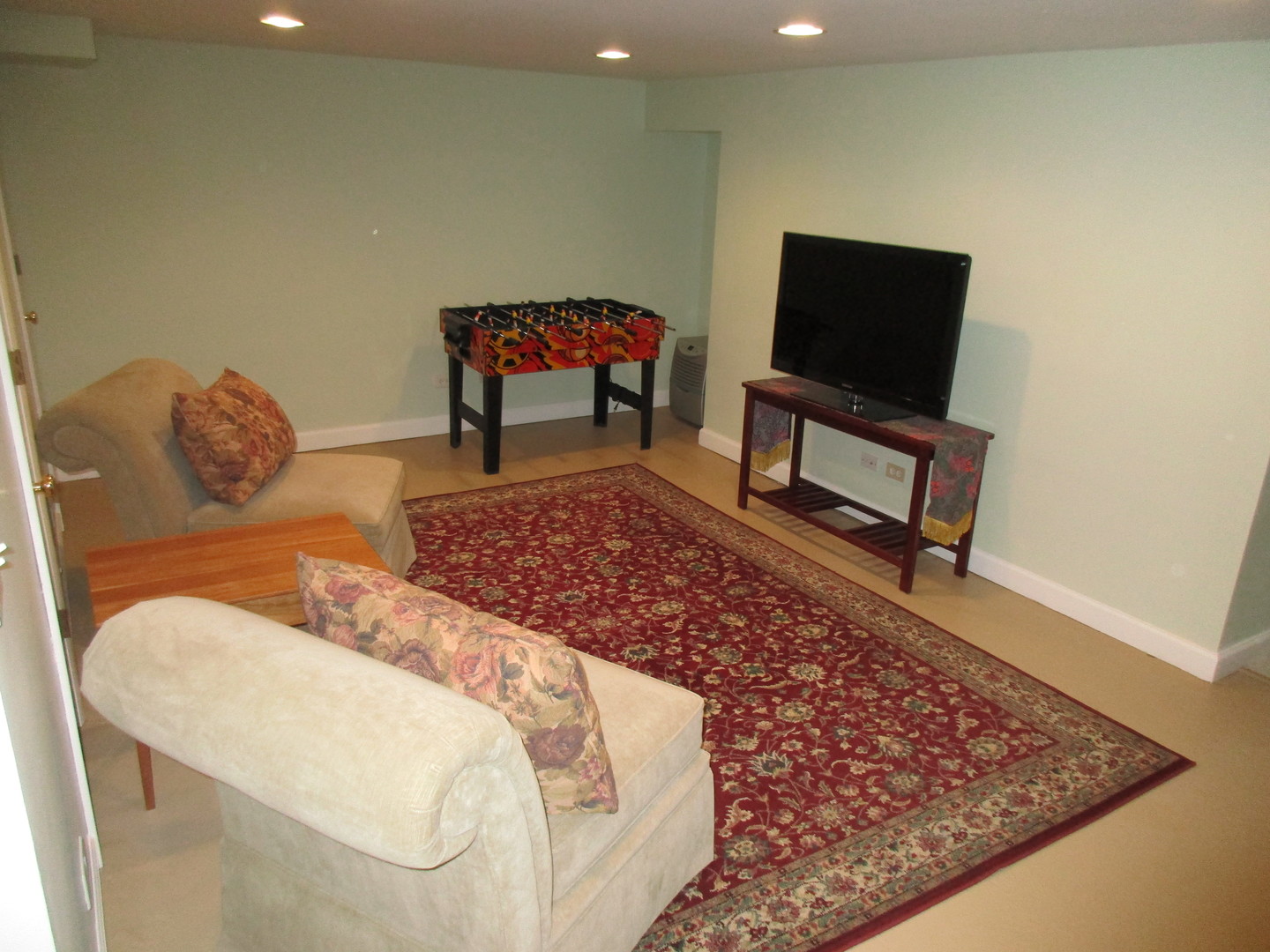 317 Shenstone Road Riverside, IL 60546 - Photo 21 of 21 a living room with a rug and a couch