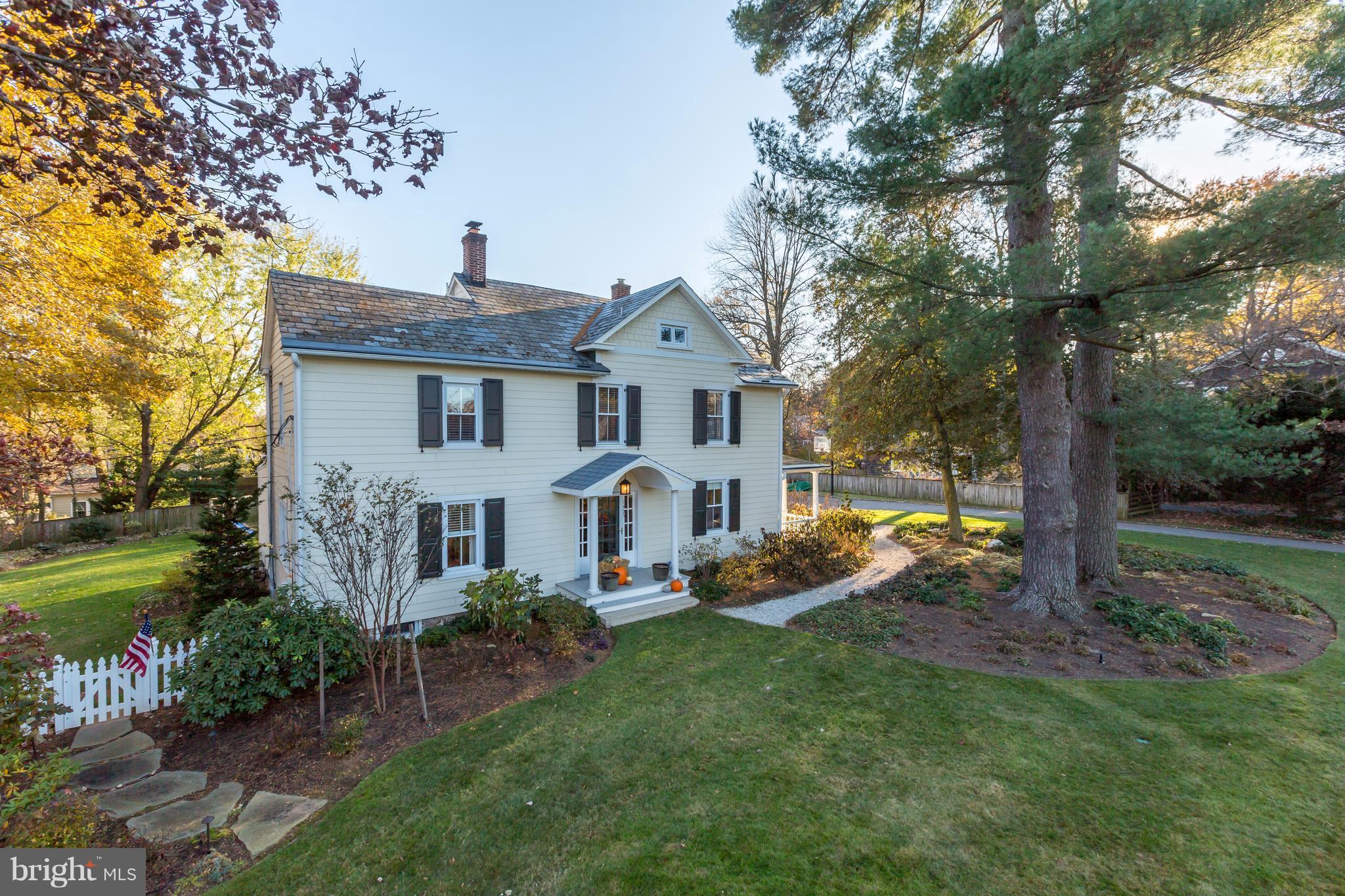 1405 Ridge Road Baltimore, MD 21228 - Photo 1 of 30 a front view of a house with garden