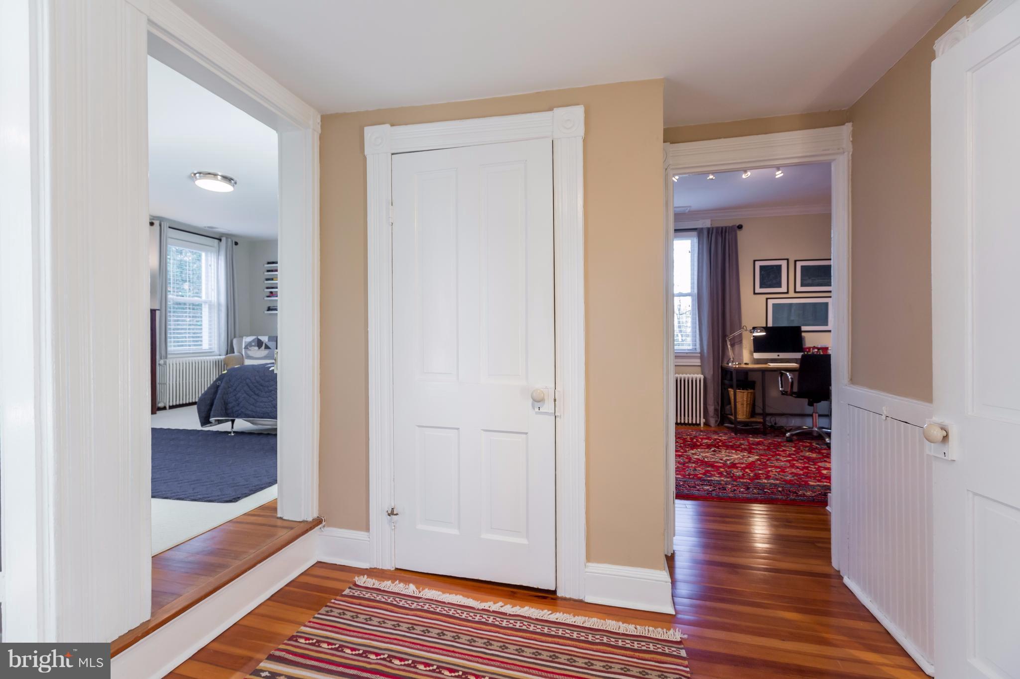 1405 Ridge Road Baltimore, MD 21228 - Photo 15 of 30 a view of a hallway with bedroom and wooden floor