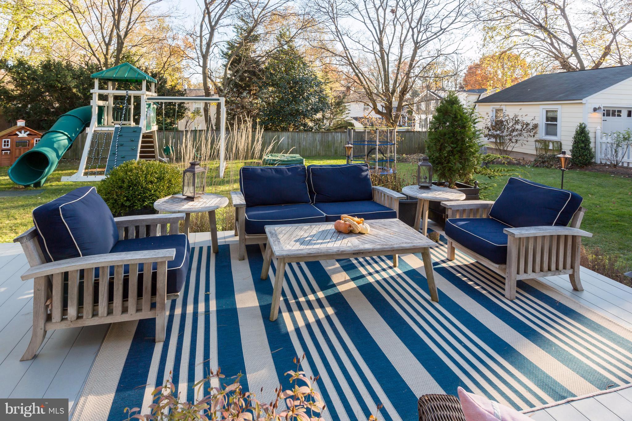 1405 Ridge Road Baltimore, MD 21228 - Photo 29 of 30 a view of a patio with couches chairs and wooden floor