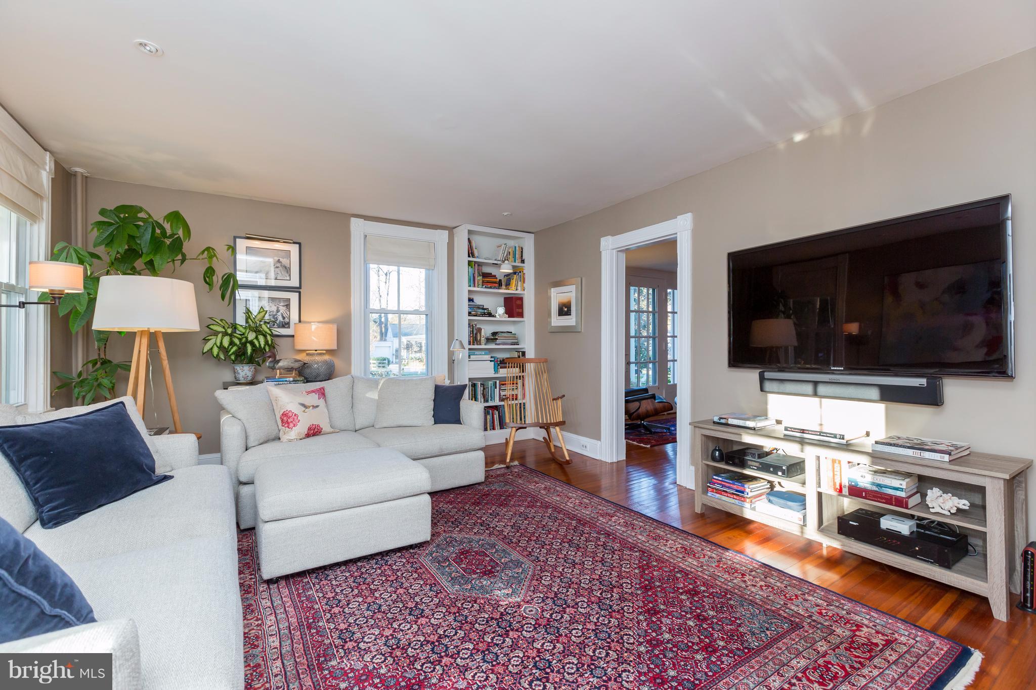 1405 Ridge Road Baltimore, MD 21228 - Photo 5 of 30 a living room with furniture and a flat screen tv