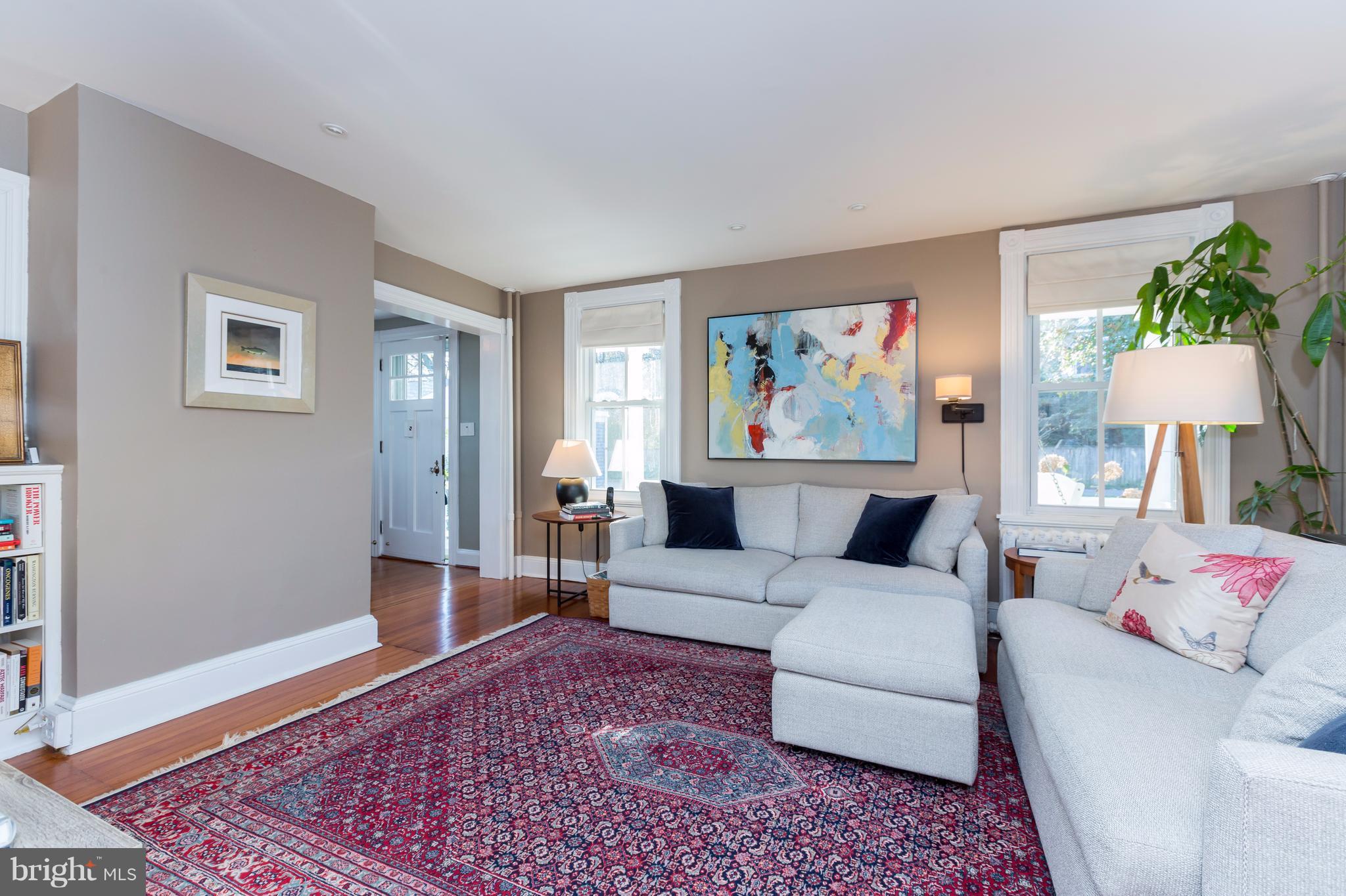 1405 Ridge Road Baltimore, MD 21228 - Photo 6 of 30 a living room with furniture and a painting on the wall