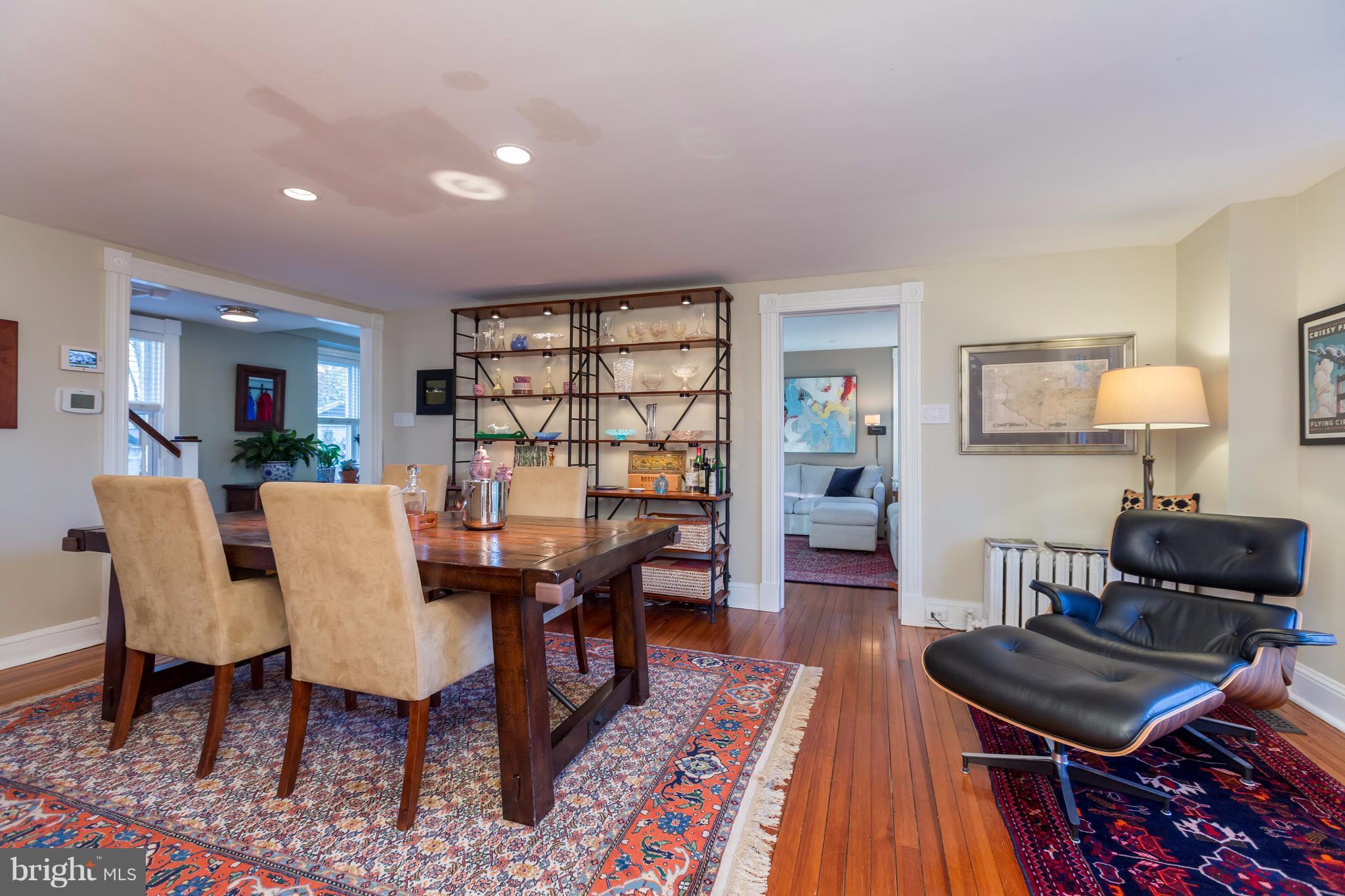 1405 Ridge Road Baltimore, MD 21228 - Photo 10 of 30 a view of a dining room with furniture and wooden floor