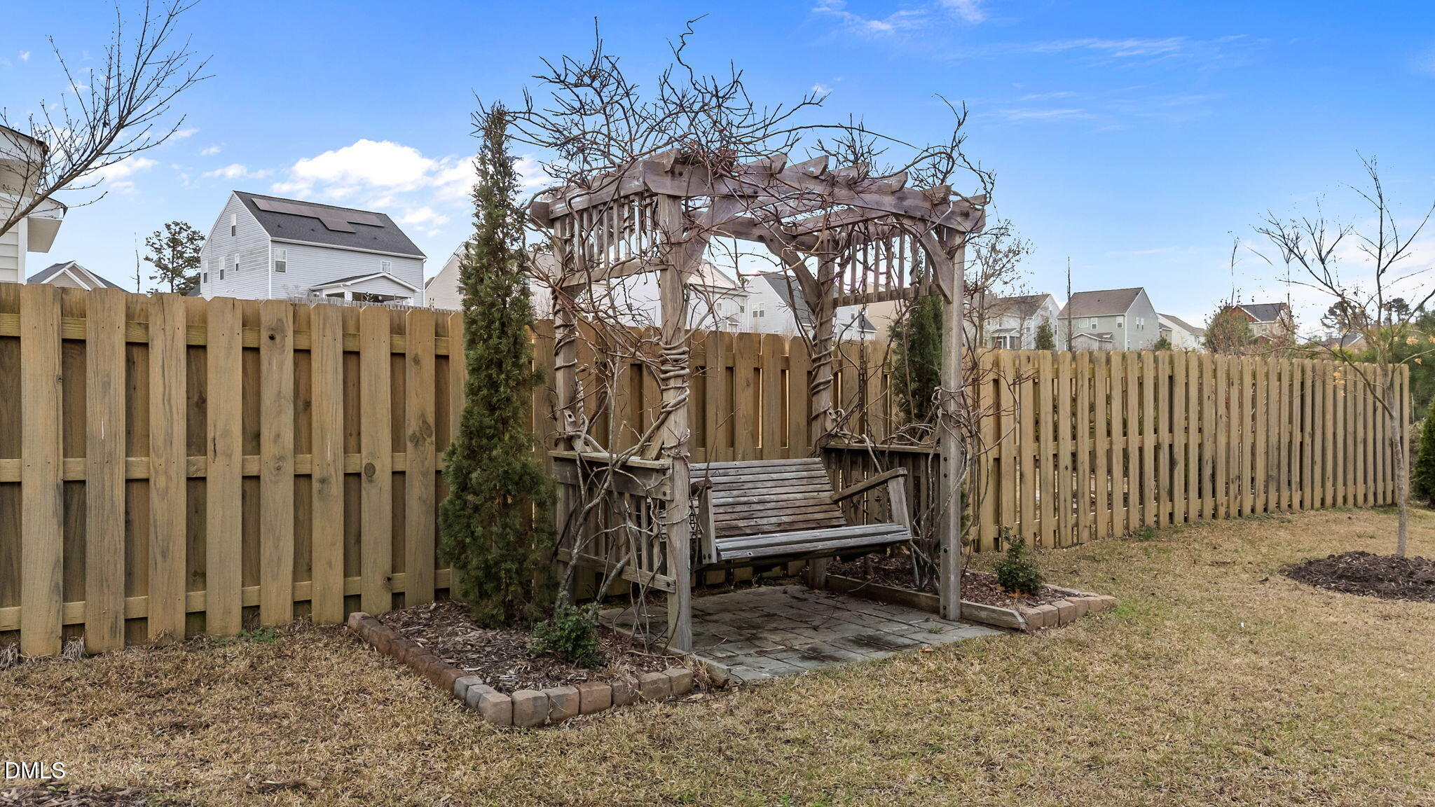 41 Solstice Lane Garner, NC 27529 - Photo 27 of 33 a view of a house with backyard and wooden fence