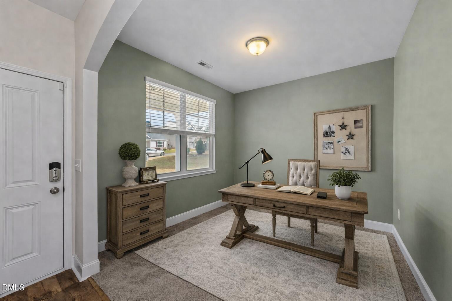 41 Solstice Lane Garner, NC 27529 - Photo 2 of 33 a view of a workspace with furniture and a window