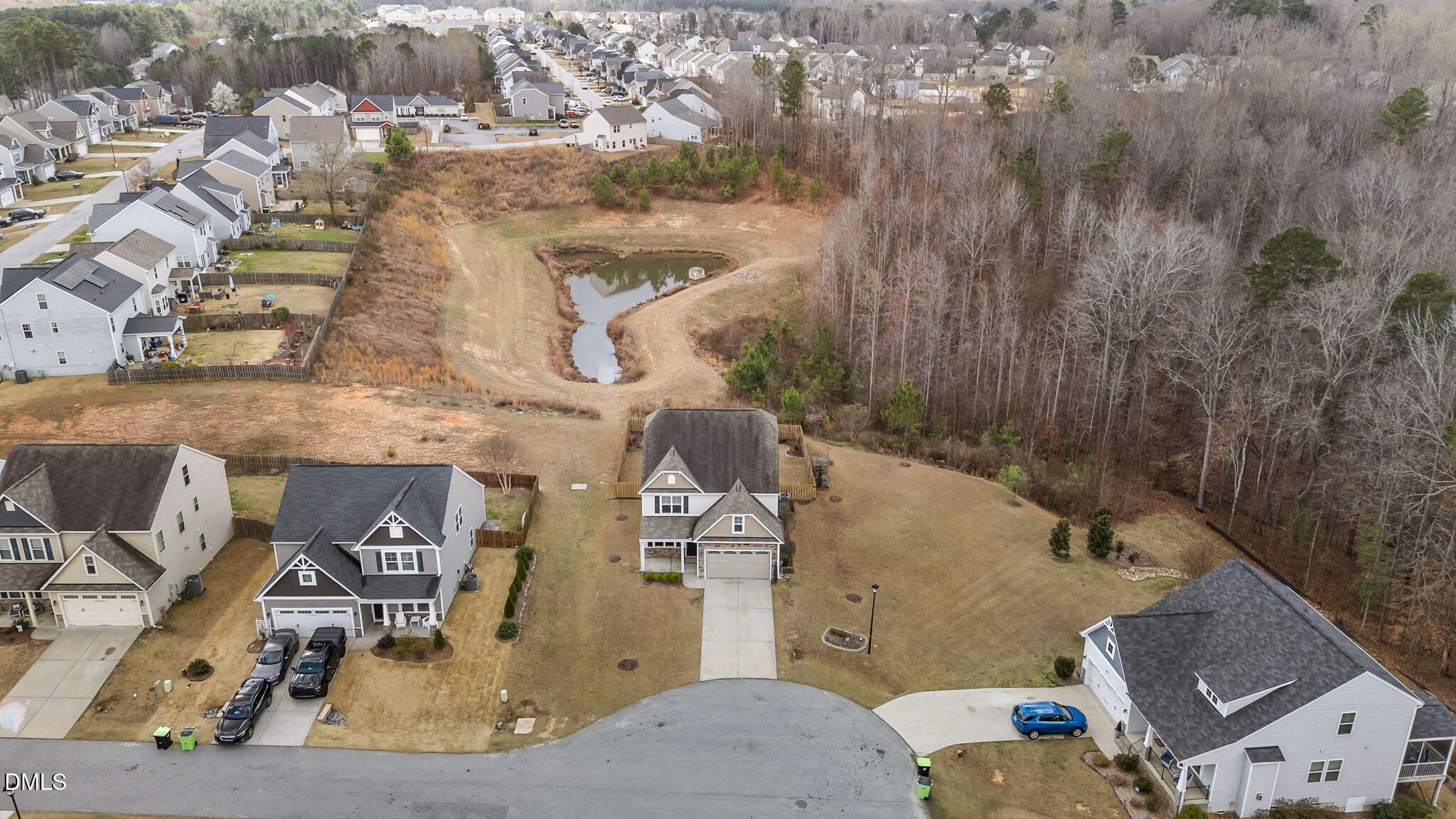 41 Solstice Lane Garner, NC 27529 - Photo 31 of 33 an aerial view of a house with a yard and sitting space