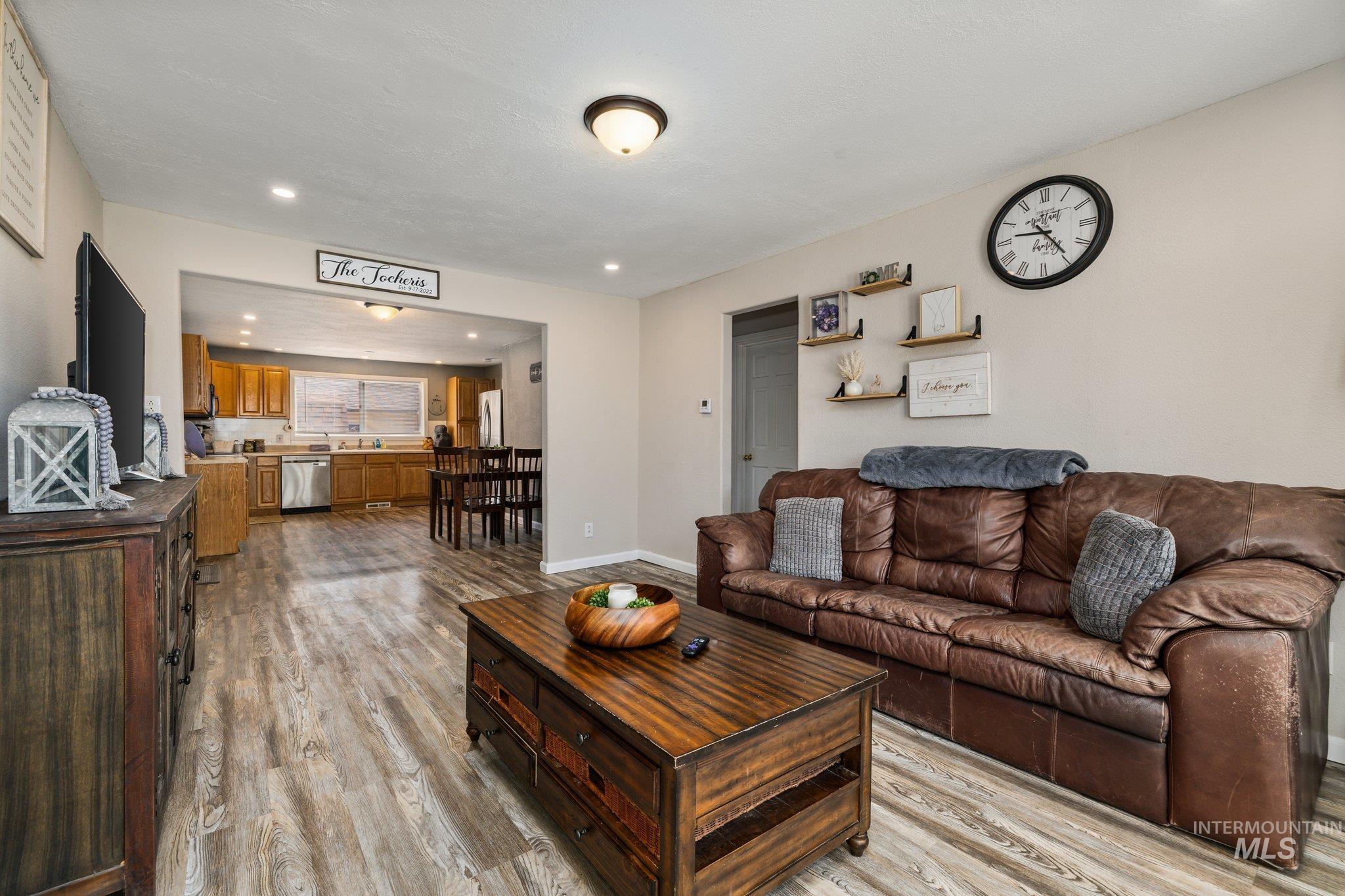 1504 2nd Street North Nampa, ID 83687 - Photo 5 of 29 Living room with light wood finished floors and recessed lighting