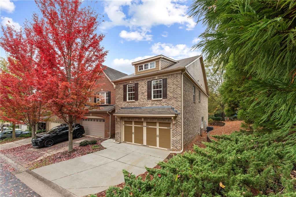 3803 Manor View Alpharetta, GA 30004 - Photo 11 of 33 a front view of a house with garden