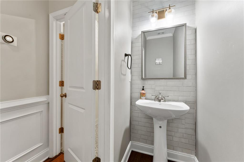 3803 Manor View Alpharetta, GA 30004 - Photo 18 of 33 a bathroom with a sink and a mirror