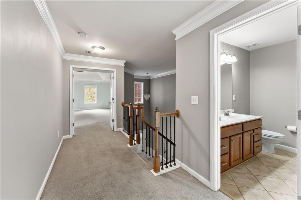 3803 Manor View Alpharetta, GA 30004 - Photo 21 of 33 a view of a hallway view with three rooms