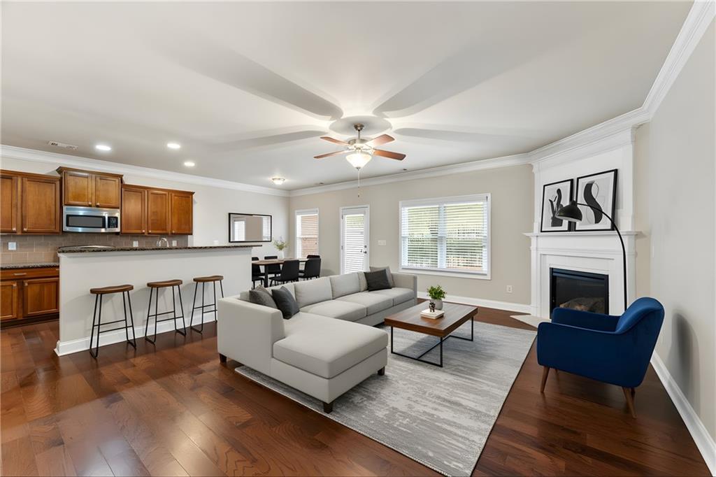 3803 Manor View Alpharetta, GA 30004 - Photo 3 of 33 a living room with furniture fireplace and window