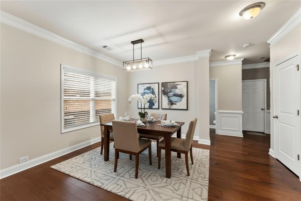 3803 Manor View Alpharetta, GA 30004 - Photo 4 of 33 a view of a dining room with furniture window and wooden floor