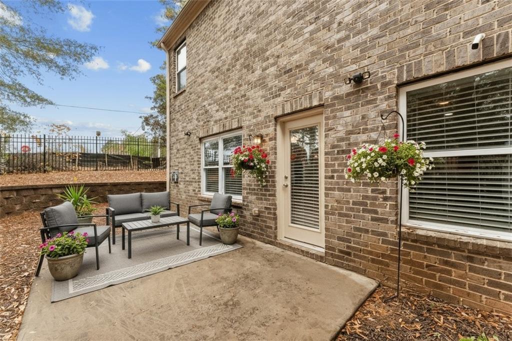 3803 Manor View Alpharetta, GA 30004 - Photo 9 of 33 a view of a patio with couches and potted plants