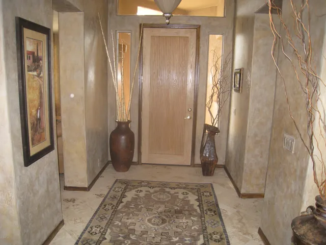 a view of a bathroom with shower and closet