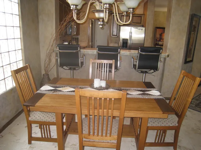 a view of a dining room with furniture