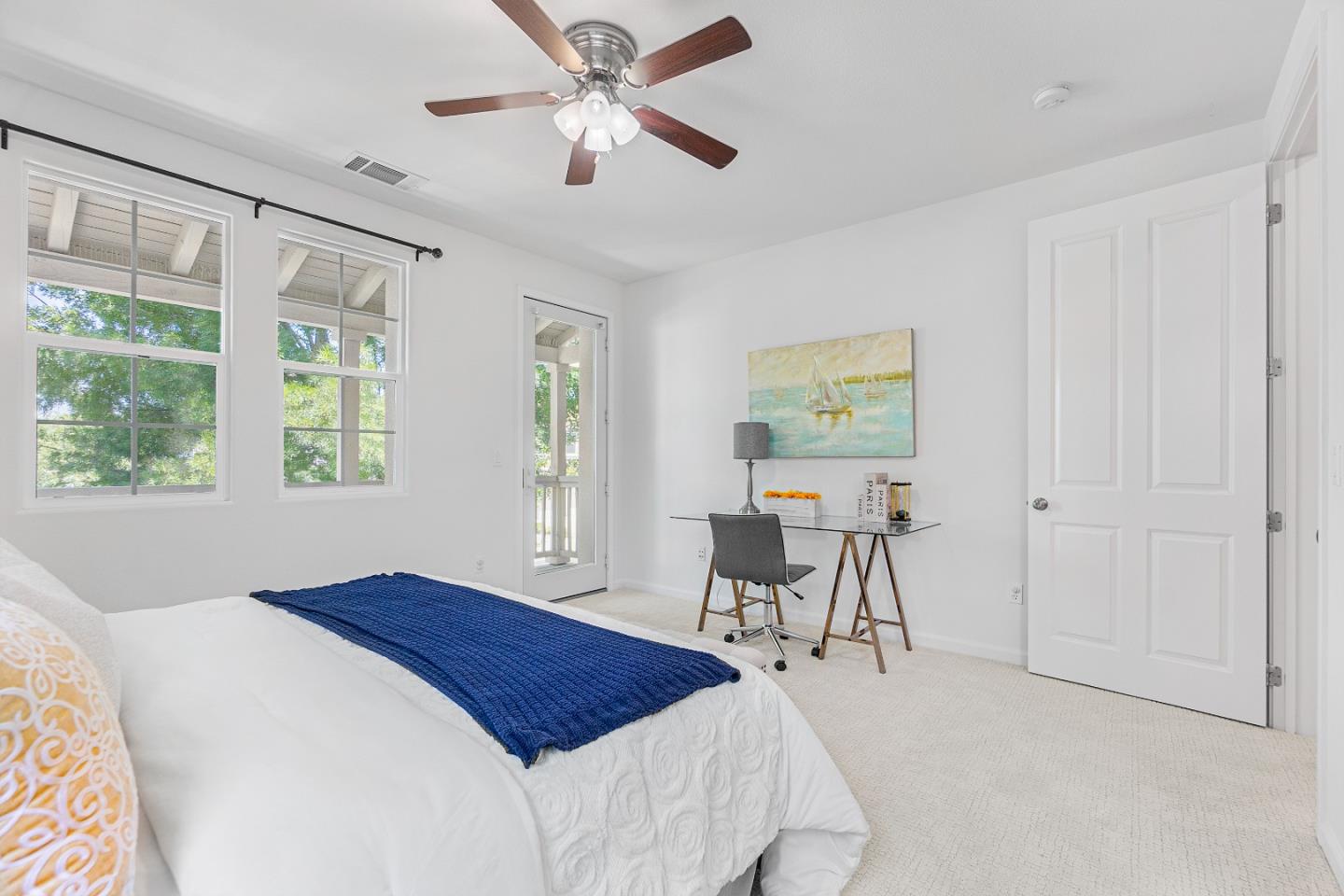 4232 Astor Hollow Street San Ramon, CA 94582 - Photo 16 of 37 a bedroom with a bed and a table in it with window