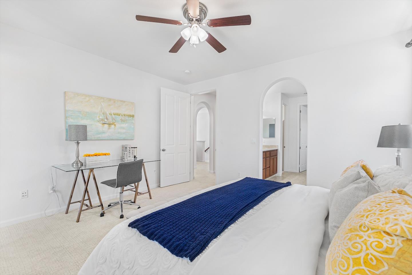 4232 Astor Hollow Street San Ramon, CA 94582 - Photo 17 of 37 a bedroom with a bed and a chandelier